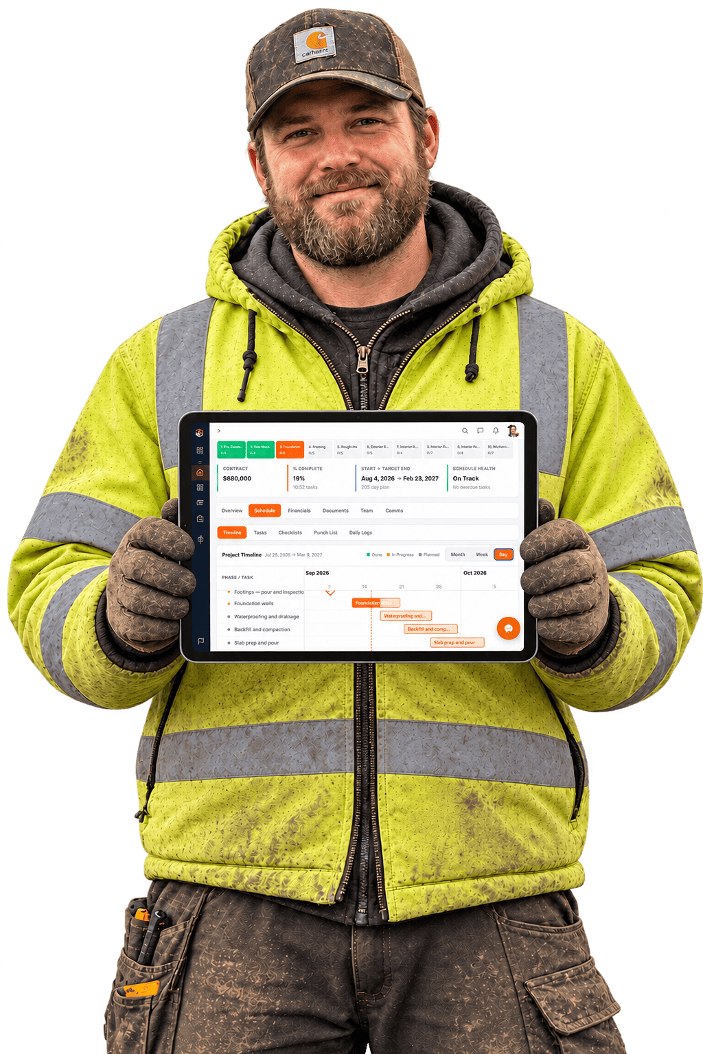 A contractor in a hi-vis jacket holding a tablet showing a WorkHoist project schedule